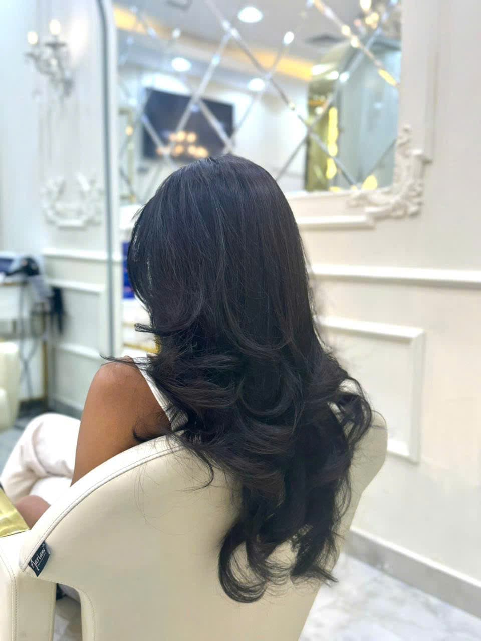 Hair treatment and blowout service in JVC Dubai salon